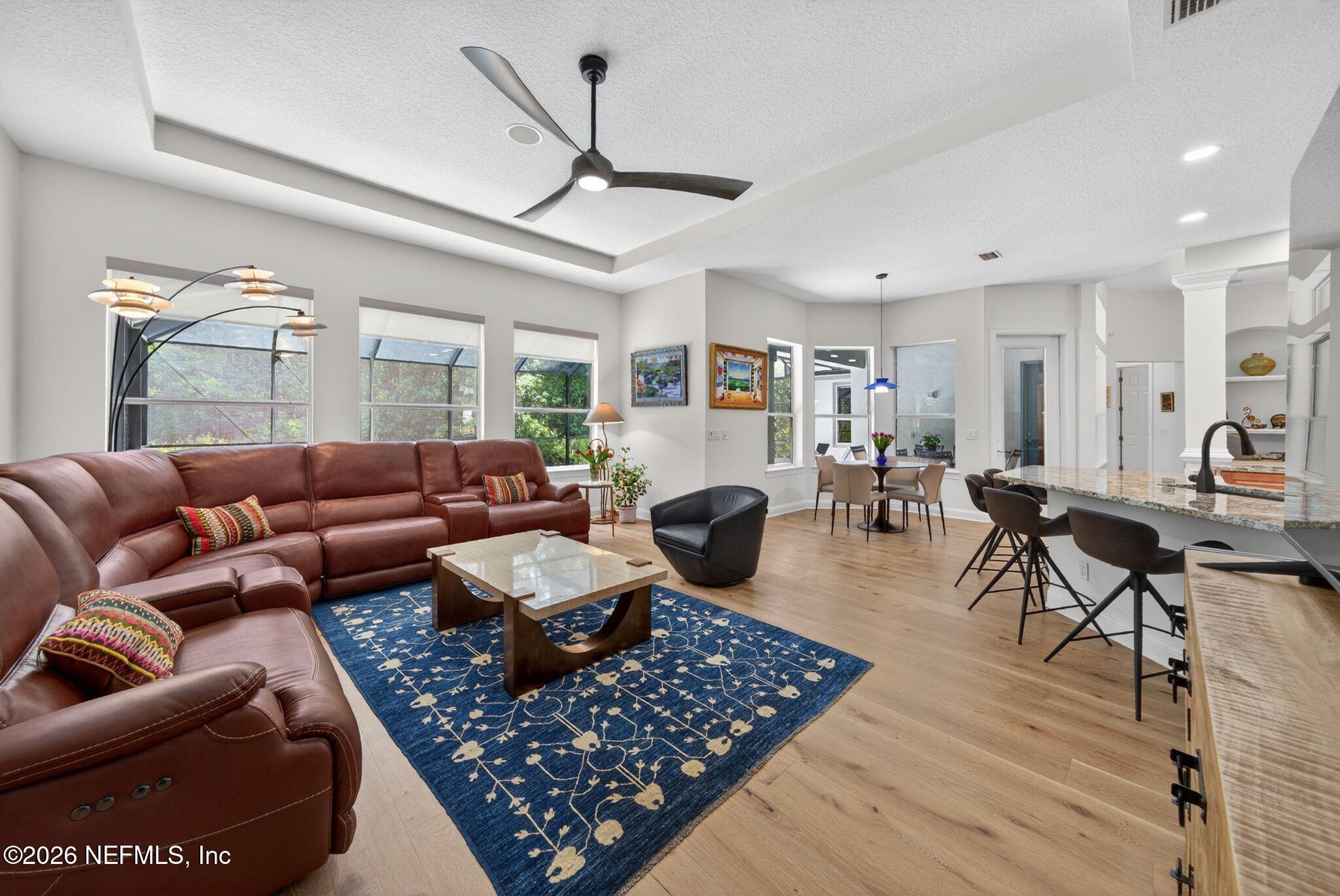 508 Sebastian Square St. Augustine, FL 32095 - Photo 5 of 76 a living room with furniture a wooden floor and ceiling fan