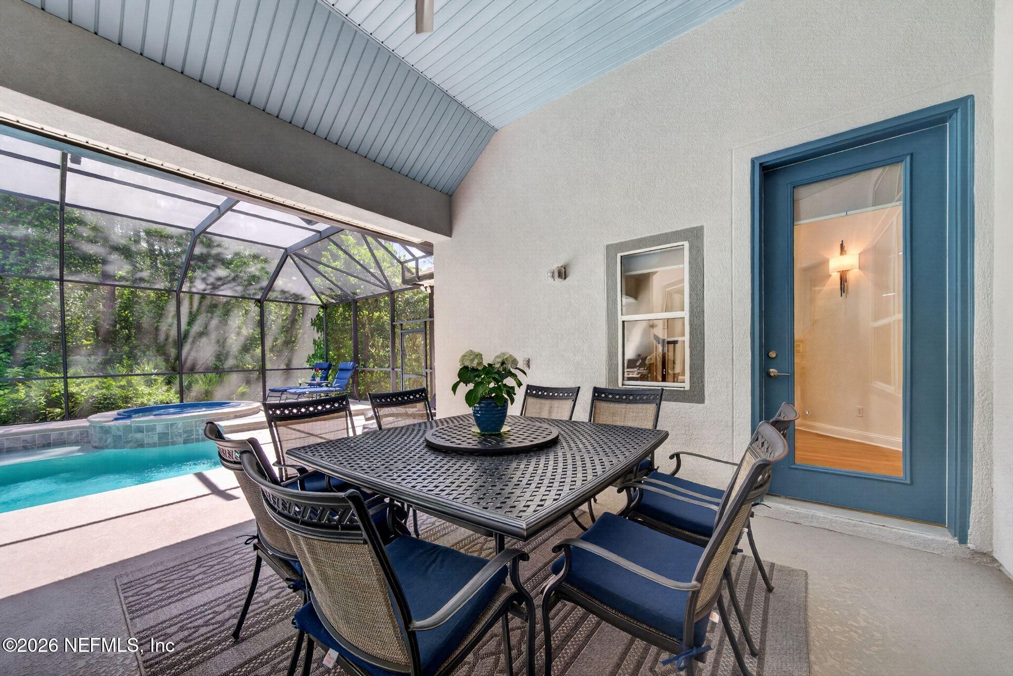 508 Sebastian Square St. Augustine, FL 32095 - Photo 9 of 76 a view of an outdoor dining space with a table and chairs