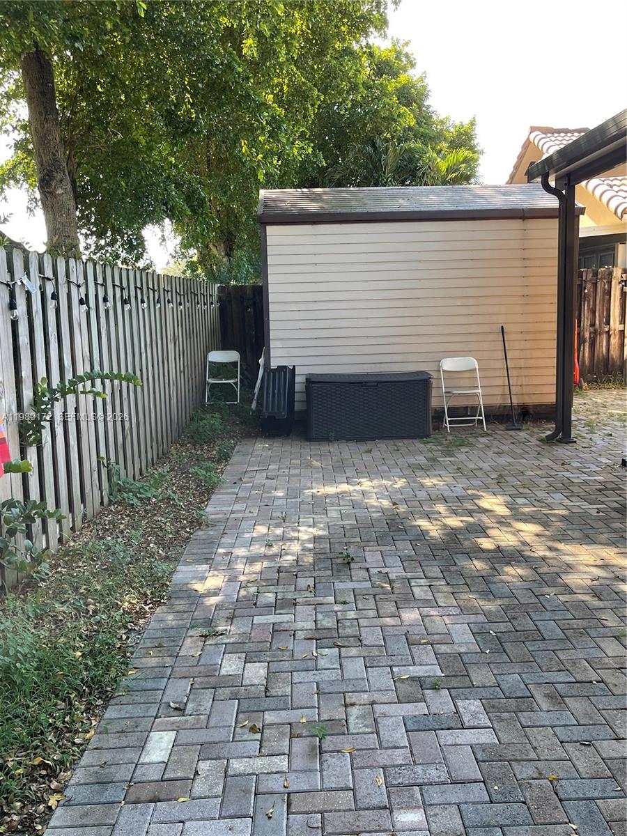 7632 Northwest 166th Terrace Hialeah, FL 33015 - Photo 20 of 20 a view of a house with a yard