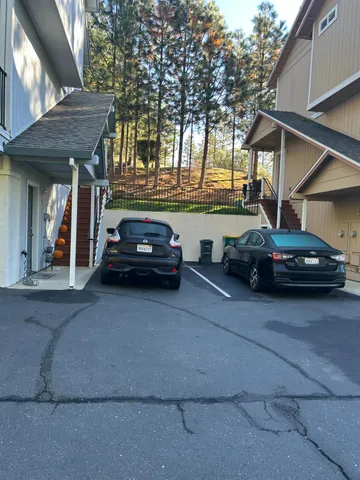 a car parked in front of a house