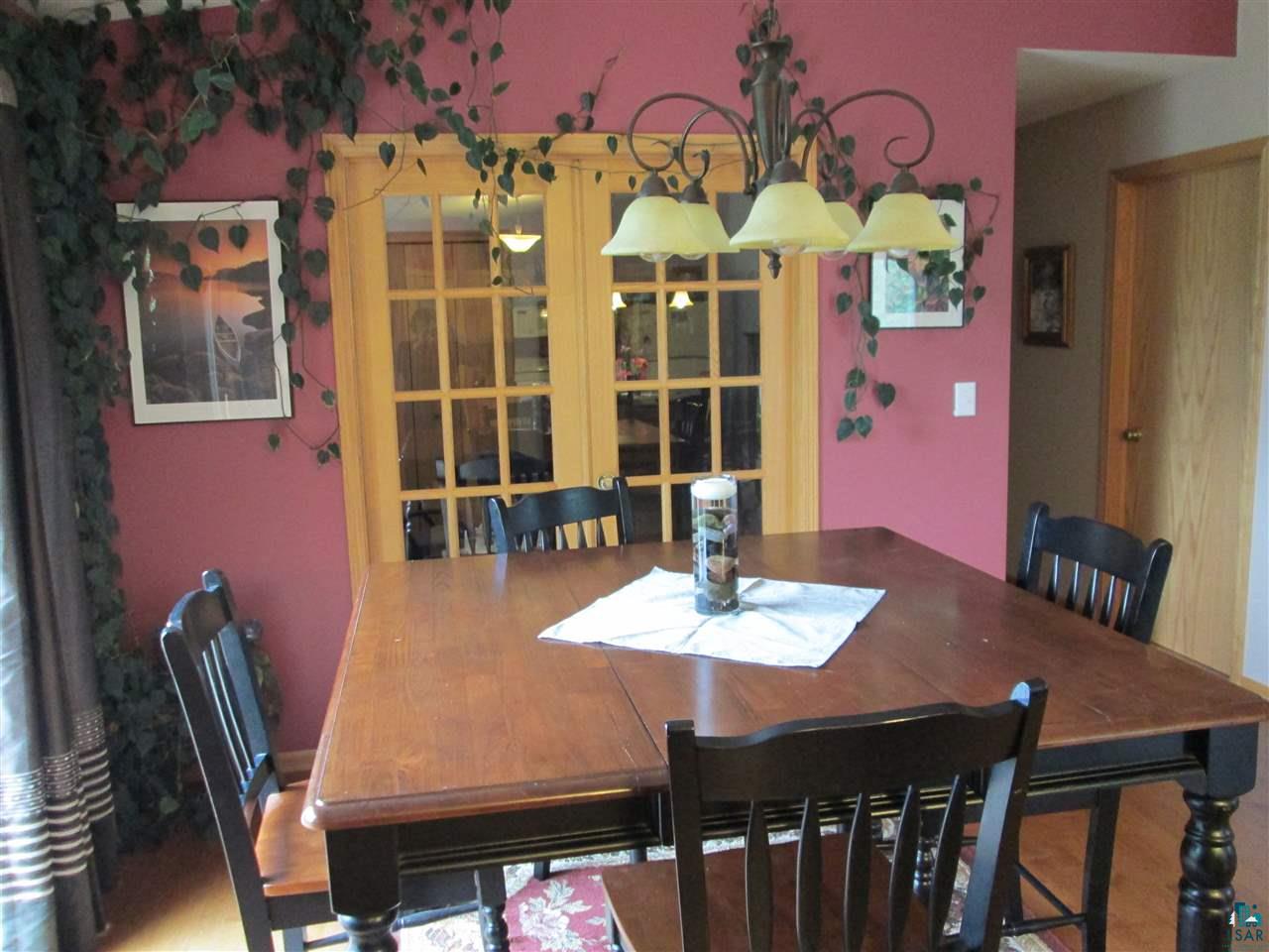 224 Devil Track Road Grand Marais, MN 55604 - Photo 4 of 24 Dining area with Den in background