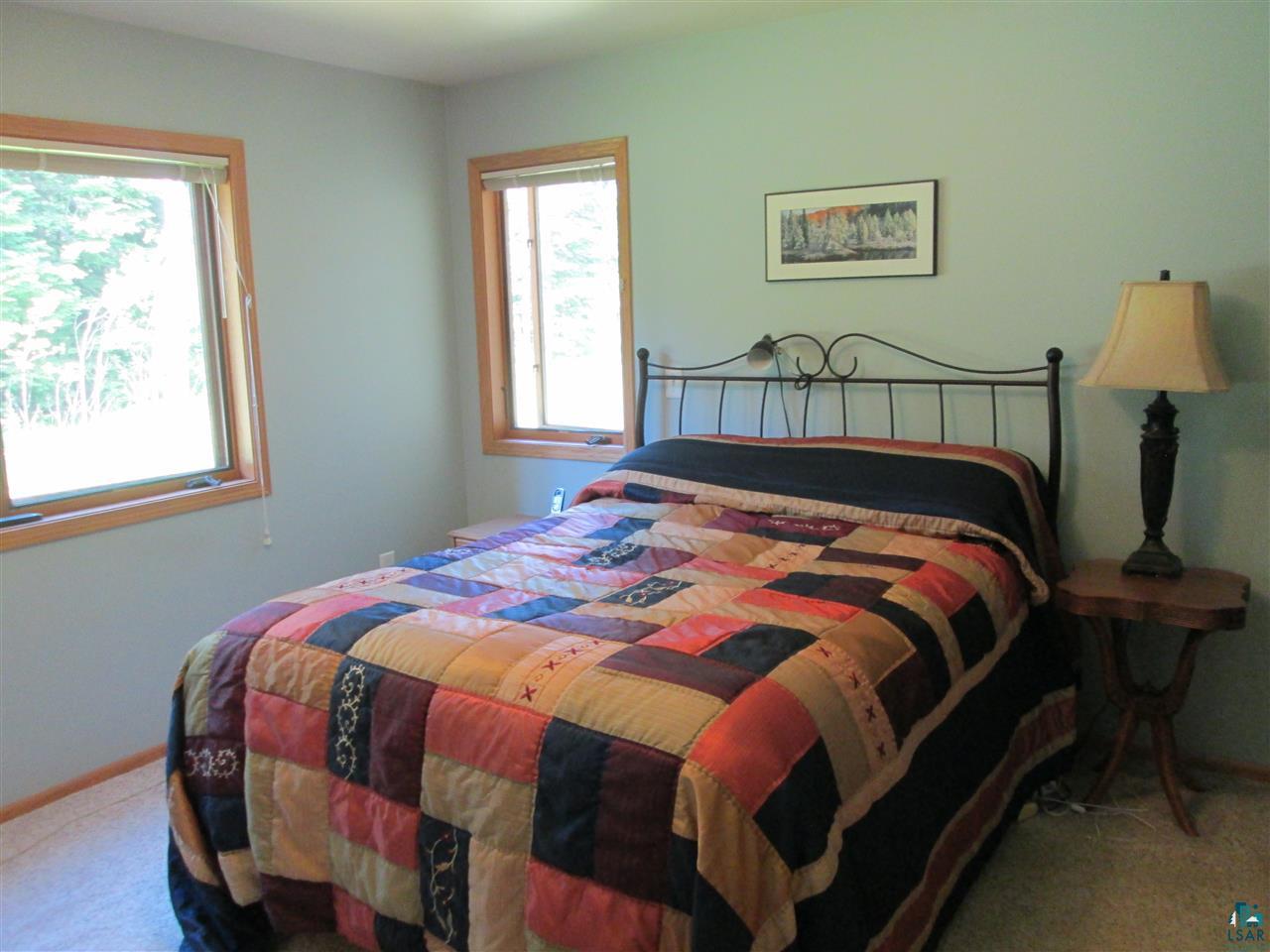224 Devil Track Road Grand Marais, MN 55604 - Photo 10 of 24 Master suite with full bathroom