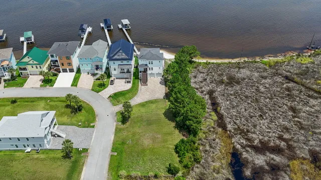 an aerial view of a house with a garden