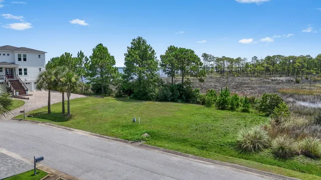 an aerial view of a chairs and table on the terrace