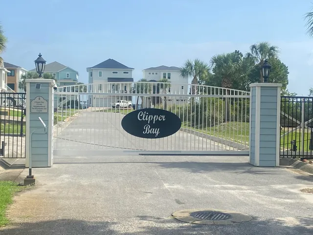 a view of a house with swimming pool and a yard