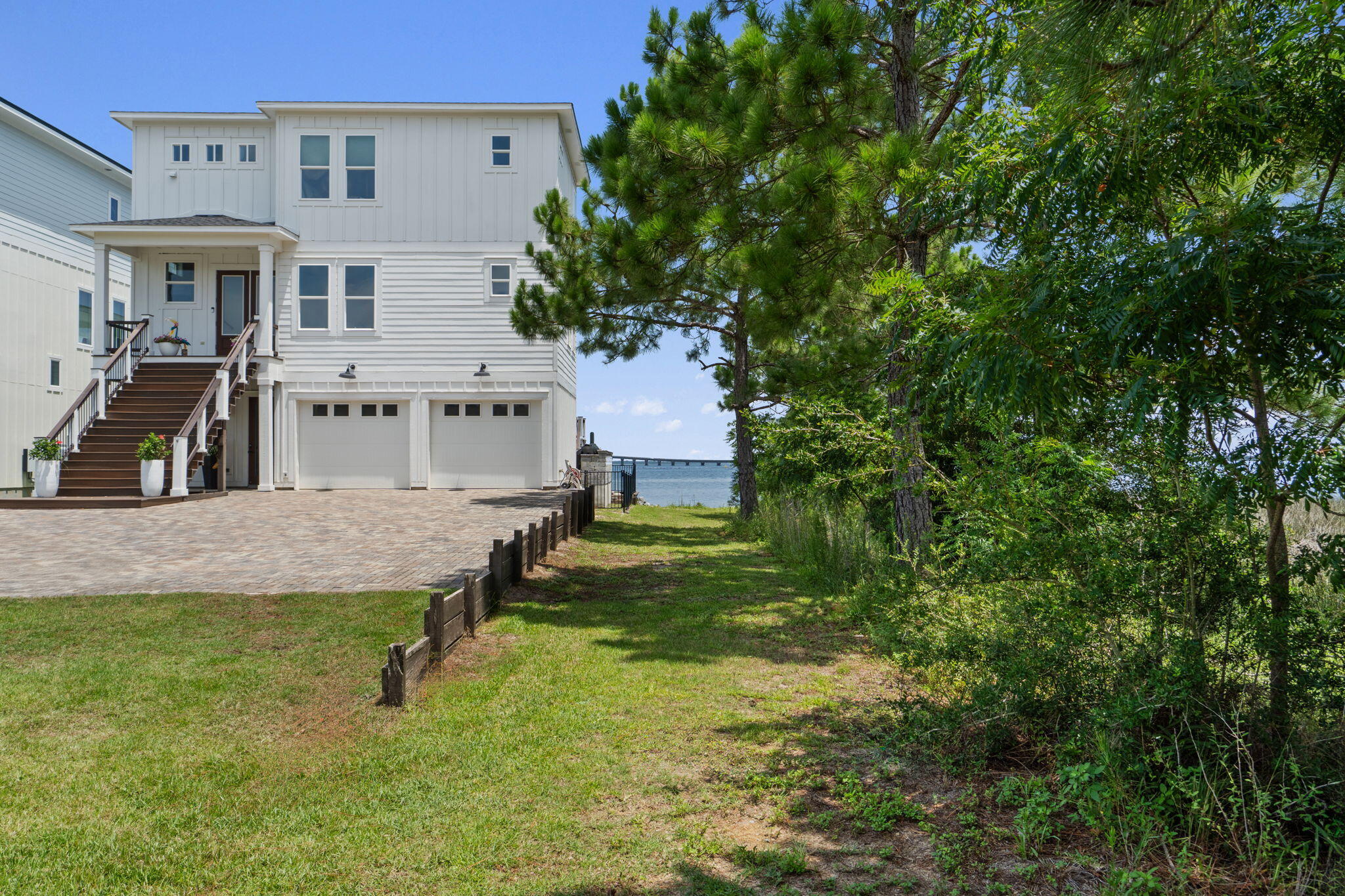 1702 Stanford Road Gulf Breeze, FL 32563 - Photo 35 of 38 a view of house with outdoor space