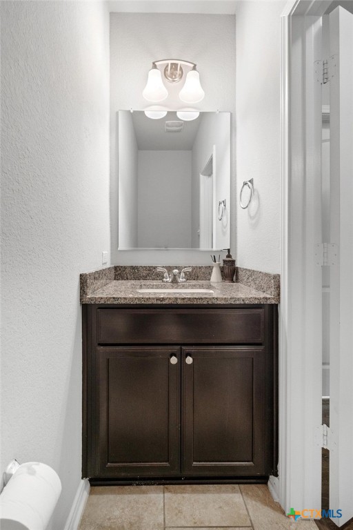 5338 Fenton Lane Belton, TX 76513 - Photo 19 of 33 a bathroom with a sink and a mirror