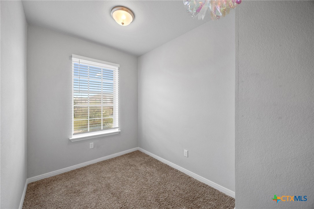 5338 Fenton Lane Belton, TX 76513 - Photo 22 of 33 an empty room with a window
