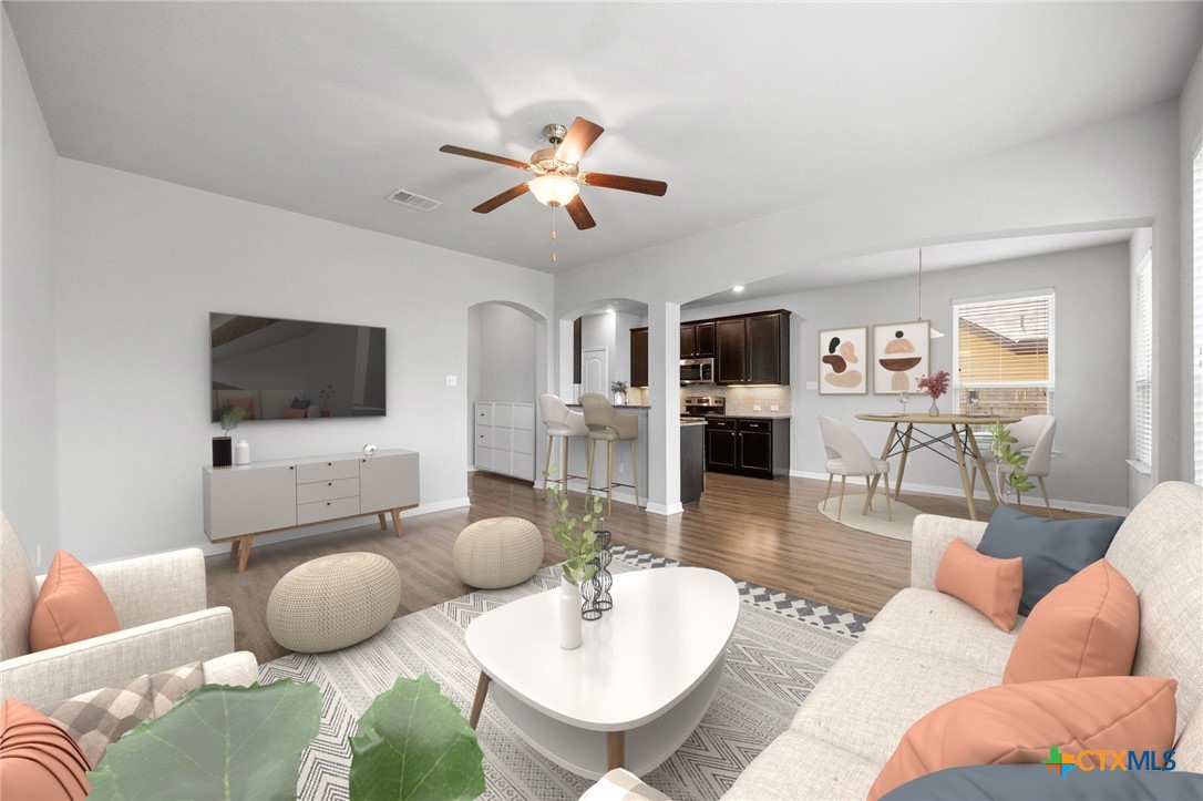 5338 Fenton Lane Belton, TX 76513 - Photo 5 of 33 a living room with furniture and a flat screen tv