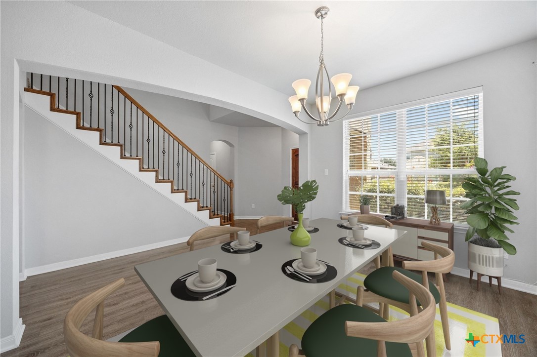 5338 Fenton Lane Belton, TX 76513 - Photo 8 of 33 a view of a dining room with furniture window and wooden floor