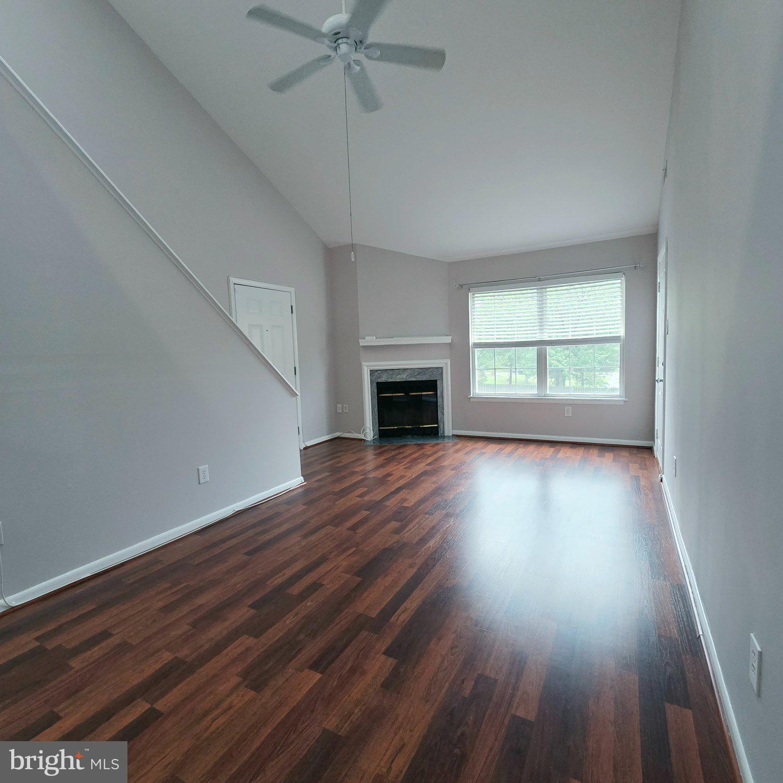 208 Ashley Run Voorhees, NJ 08043 - Photo 9 of 23 wooden floor in an empty room with a window