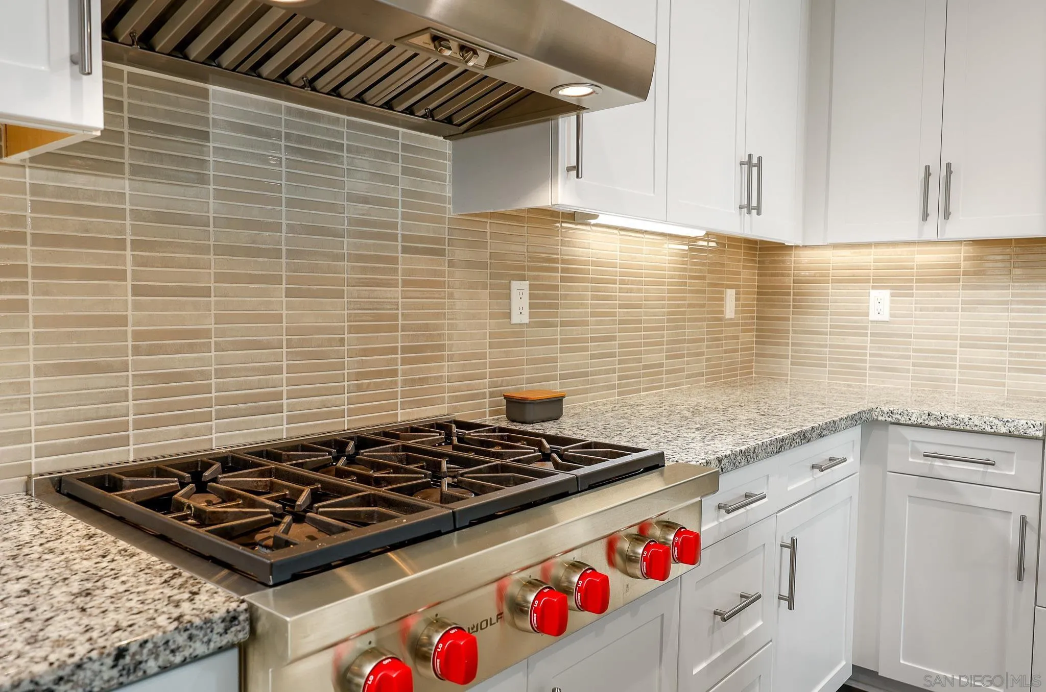 893 Woodhaven Road San Marcos, CA 92069 - Photo 12 of 33 a stove top oven sitting inside of a kitchen