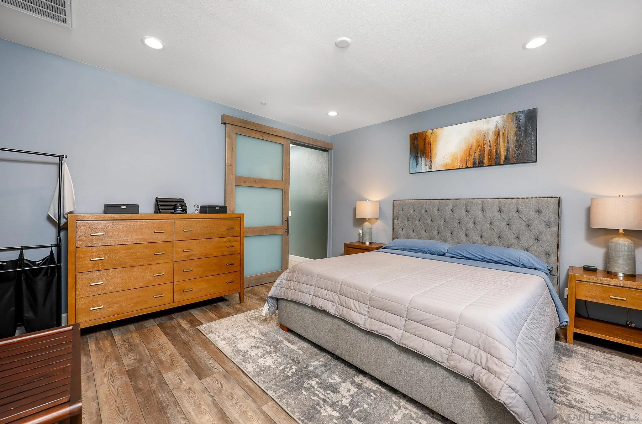 893 Woodhaven Road San Marcos, CA 92069 - Photo 17 of 33 a bedroom with a bed and a dresser