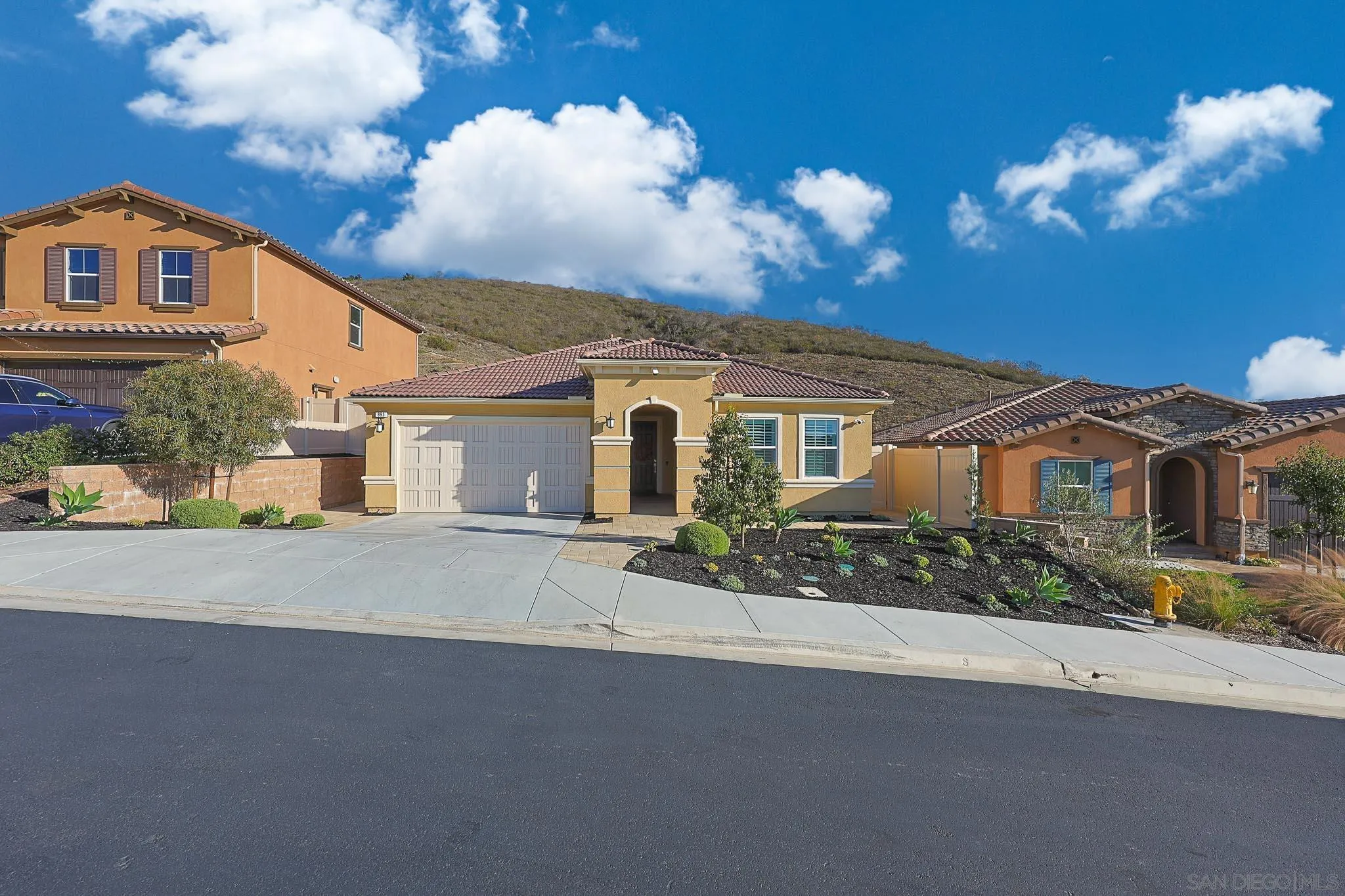 893 Woodhaven Road San Marcos, CA 92069 - Photo 2 of 33 a view of a house with a street