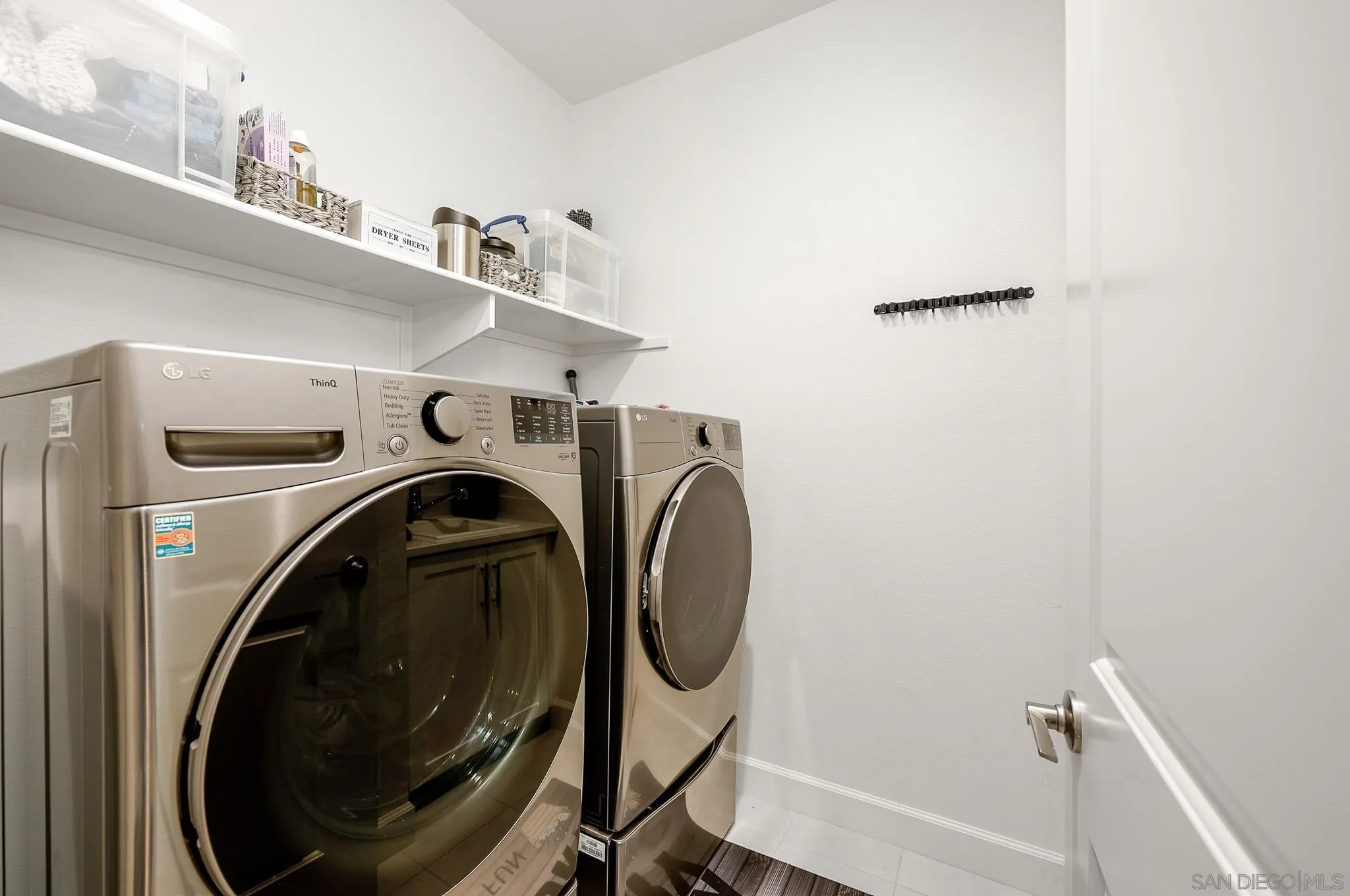 893 Woodhaven Road San Marcos, CA 92069 - Photo 22 of 33 a utility room with dryer and washer