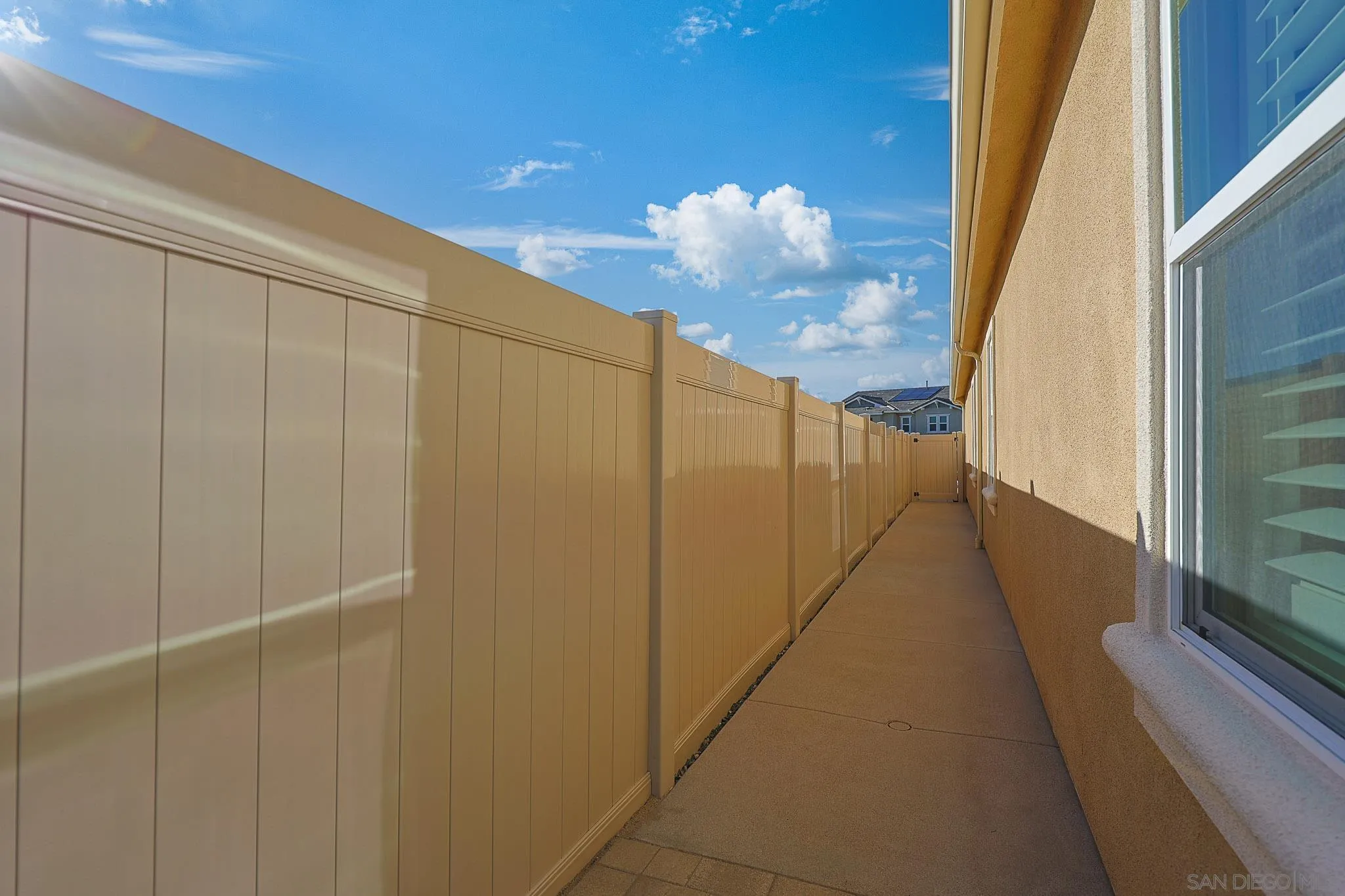 893 Woodhaven Road San Marcos, CA 92069 - Photo 29 of 33 a view of a hallway with wooden floor