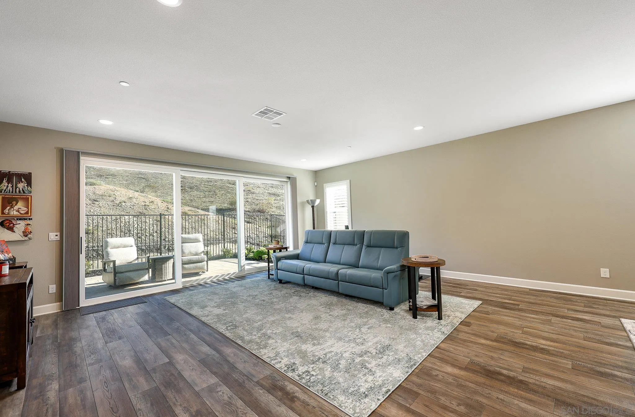 893 Woodhaven Road San Marcos, CA 92069 - Photo 4 of 33 a living room with furniture and a large window
