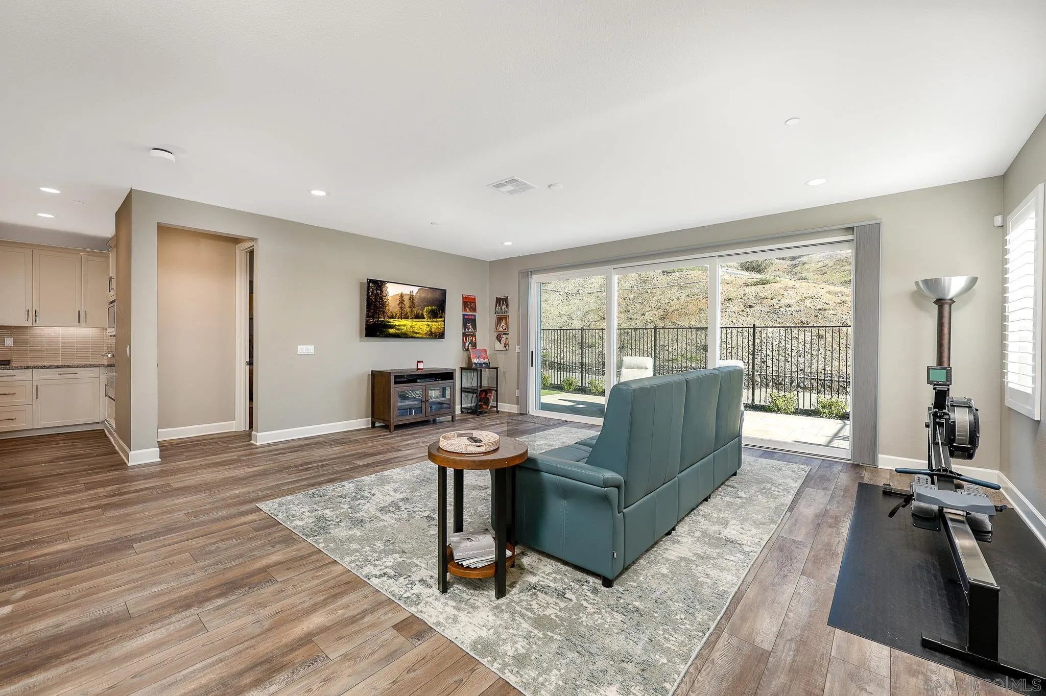 893 Woodhaven Road San Marcos, CA 92069 - Photo 5 of 33 a living room with furniture and a flat screen tv