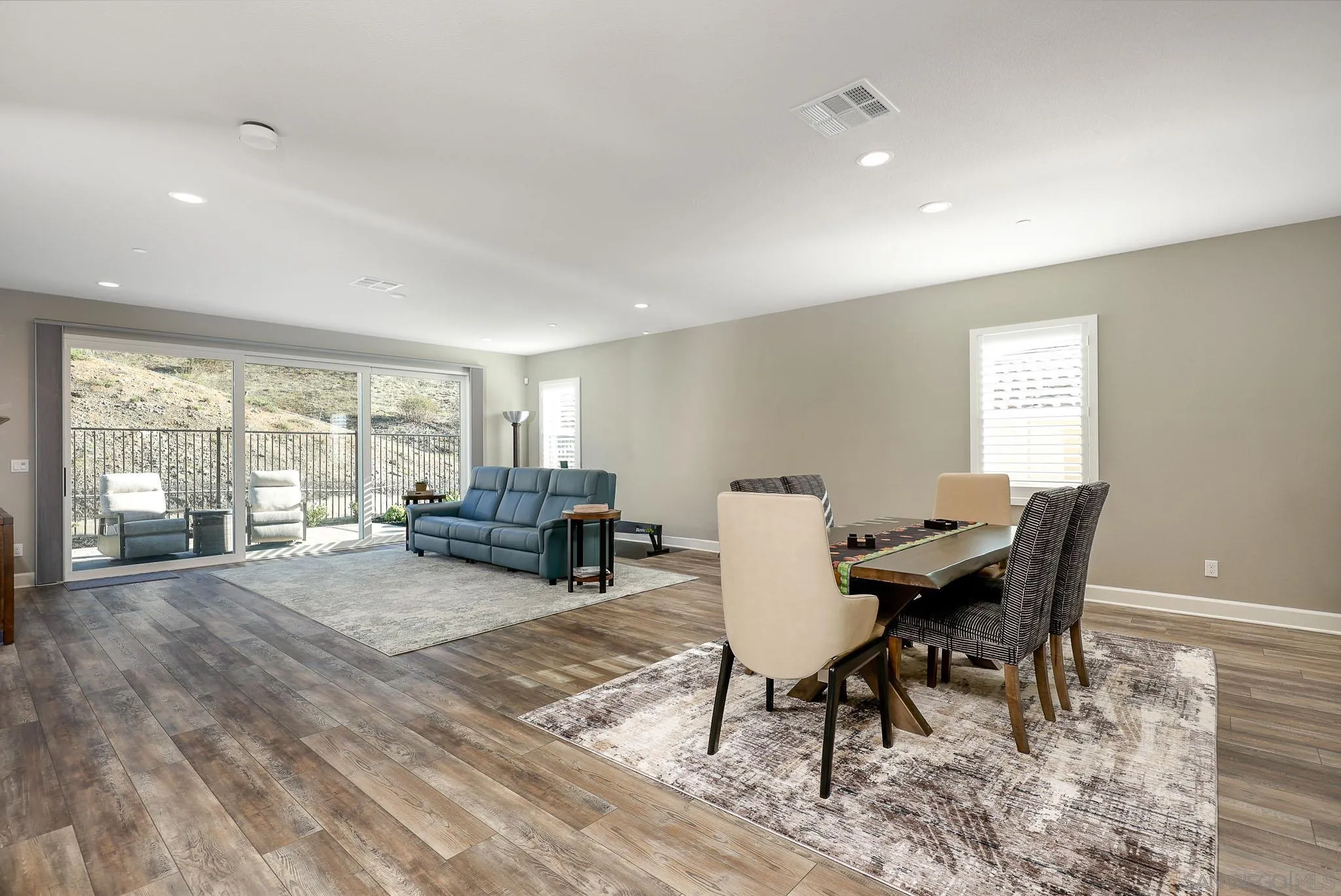 893 Woodhaven Road San Marcos, CA 92069 - Photo 8 of 33 a living room with furniture and wooden floor
