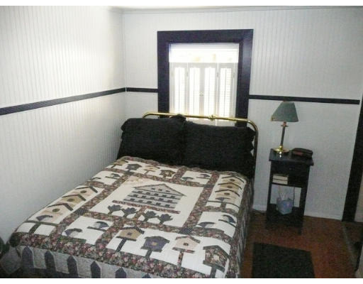 36 West Shore Road Holbrook, MA 02343 - Photo 7 of 9 a bedroom with a bed and a window