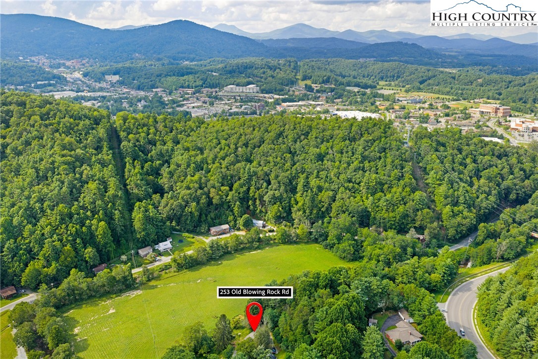 253 Old Blowing Rock Road Boone, NC 28607 - Photo 33 of 33 a view of a city with lush green forest