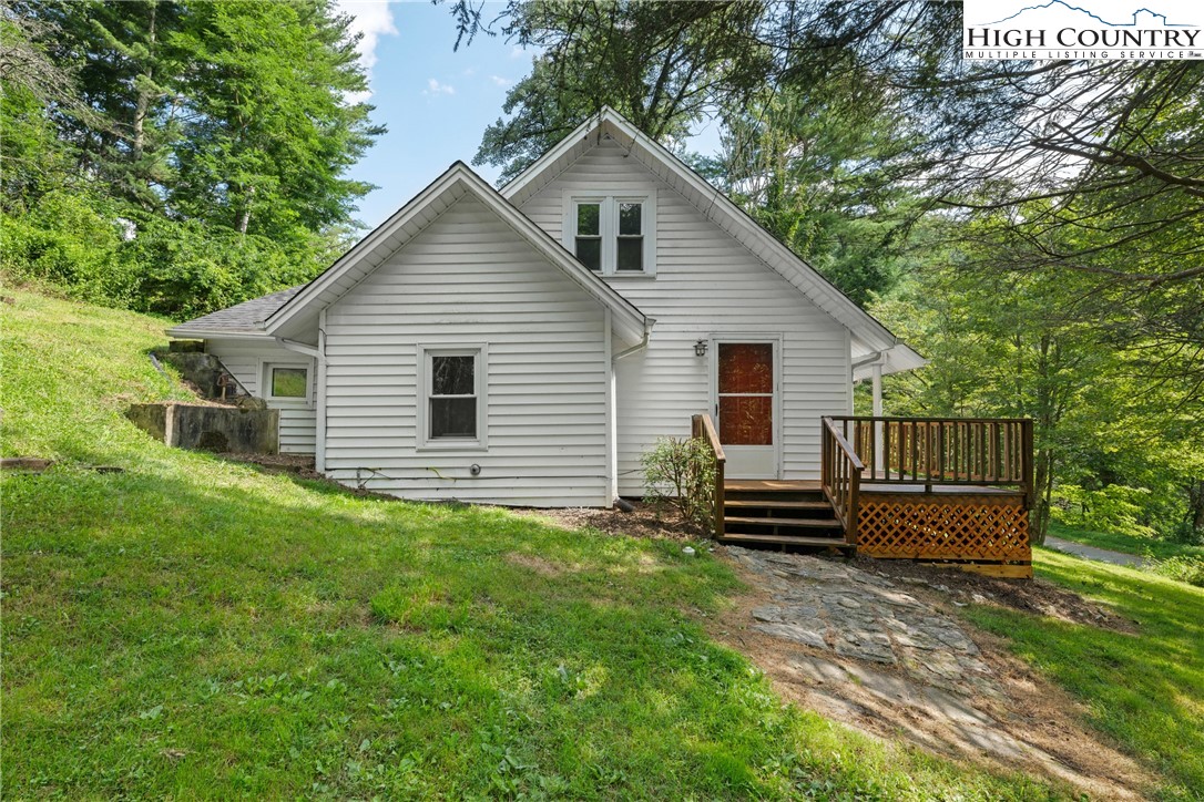 253 Old Blowing Rock Road Boone, NC 28607 - Photo 5 of 33 a view of a house with a yard