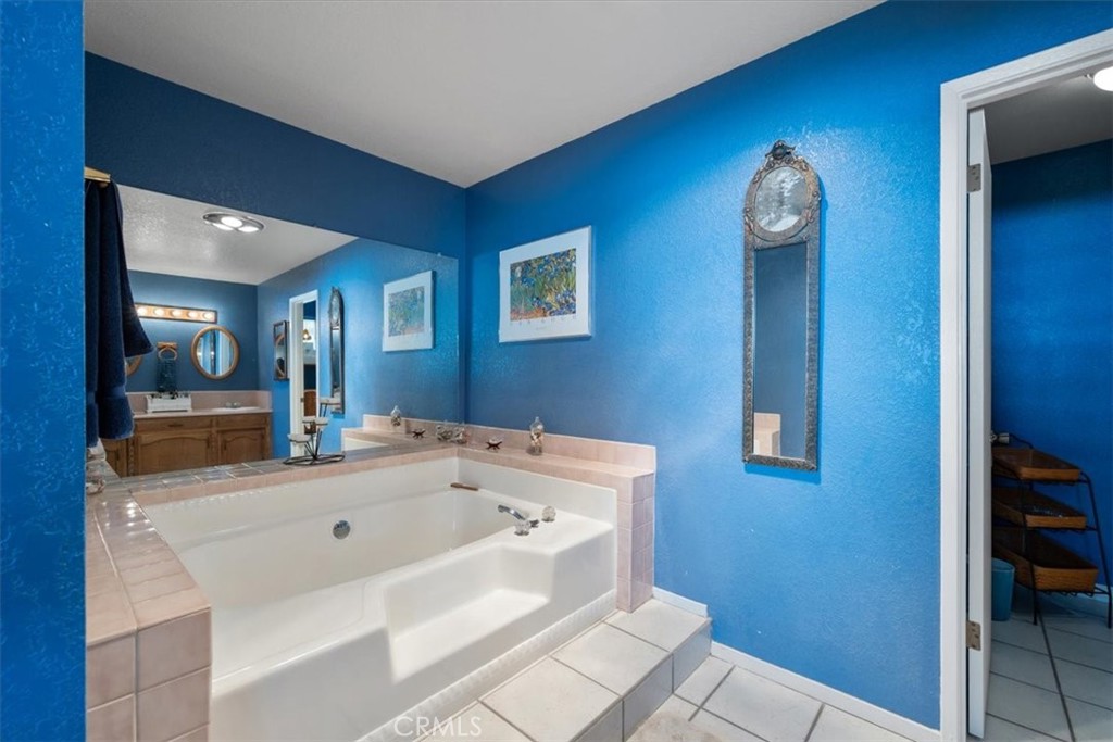2100 Starkey Road Shandon, CA 93461 - Photo 18 of 39 a bathroom with a sink and a mirror