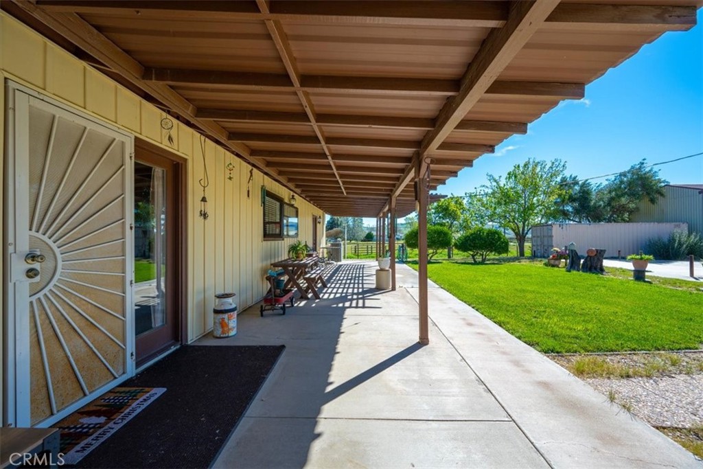 2100 Starkey Road Shandon, CA 93461 - Photo 21 of 39 a view of a porch with furniture and garden