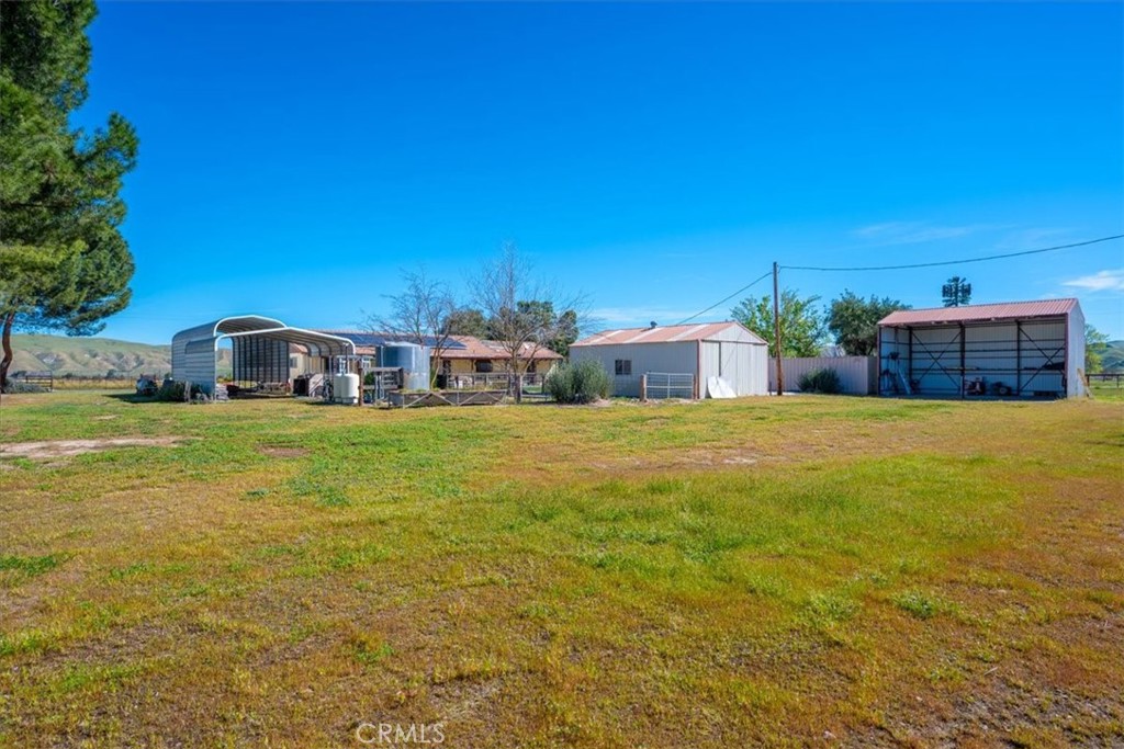 2100 Starkey Road Shandon, CA 93461 - Photo 30 of 39 a view of a house with yard and sitting area