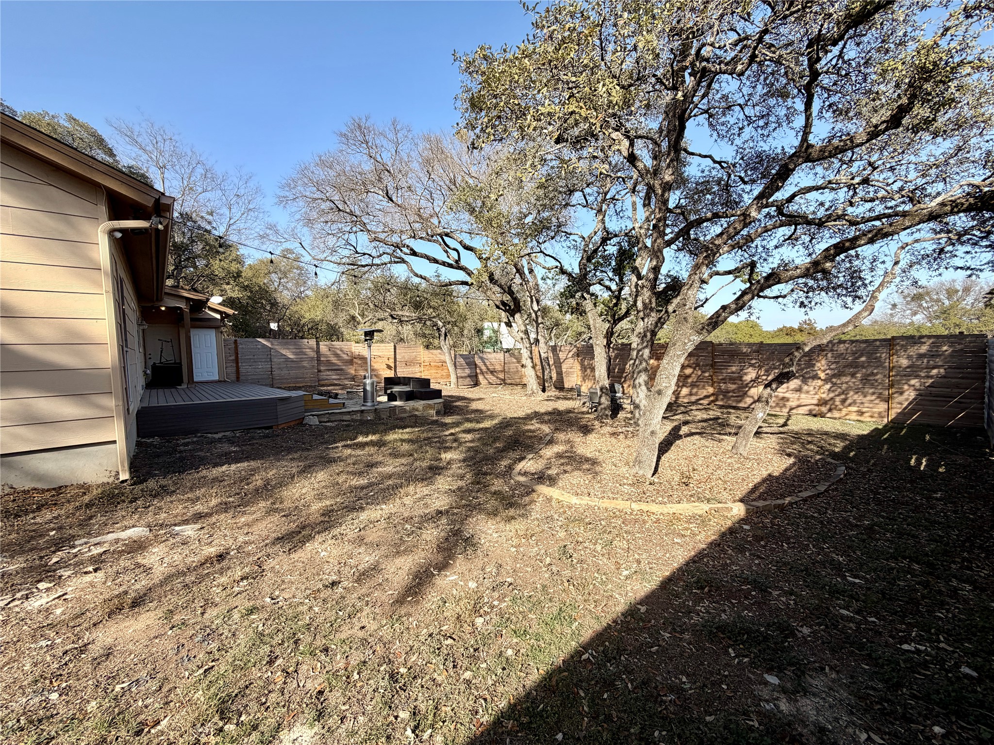 5503 Hiline Road Austin, TX 78734 - Photo 19 of 20 Fenced backyard featuring a deck