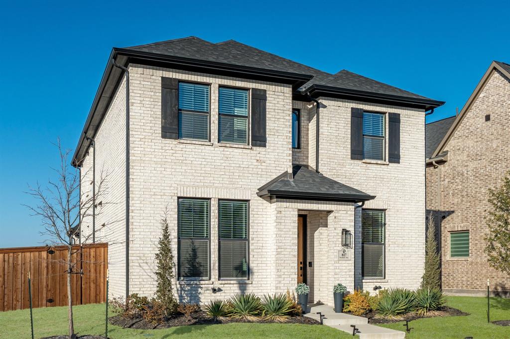 817 Isabel Street Celina, TX 75009 - Photo 1 of 39 a front view of a house with garden