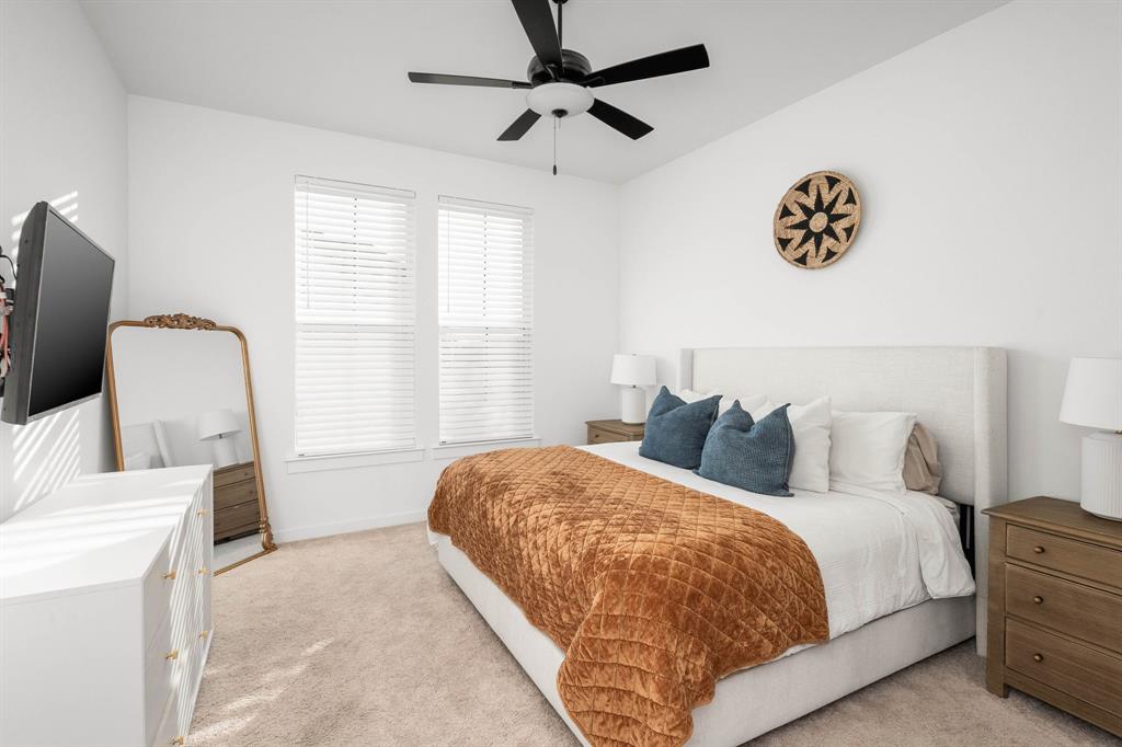 817 Isabel Street Celina, TX 75009 - Photo 12 of 39 a bedroom with bed and window