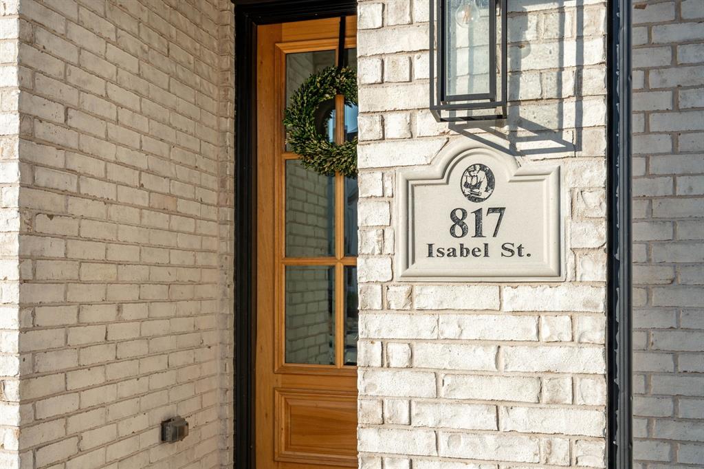 817 Isabel Street Celina, TX 75009 - Photo 2 of 39 a sign on the wall