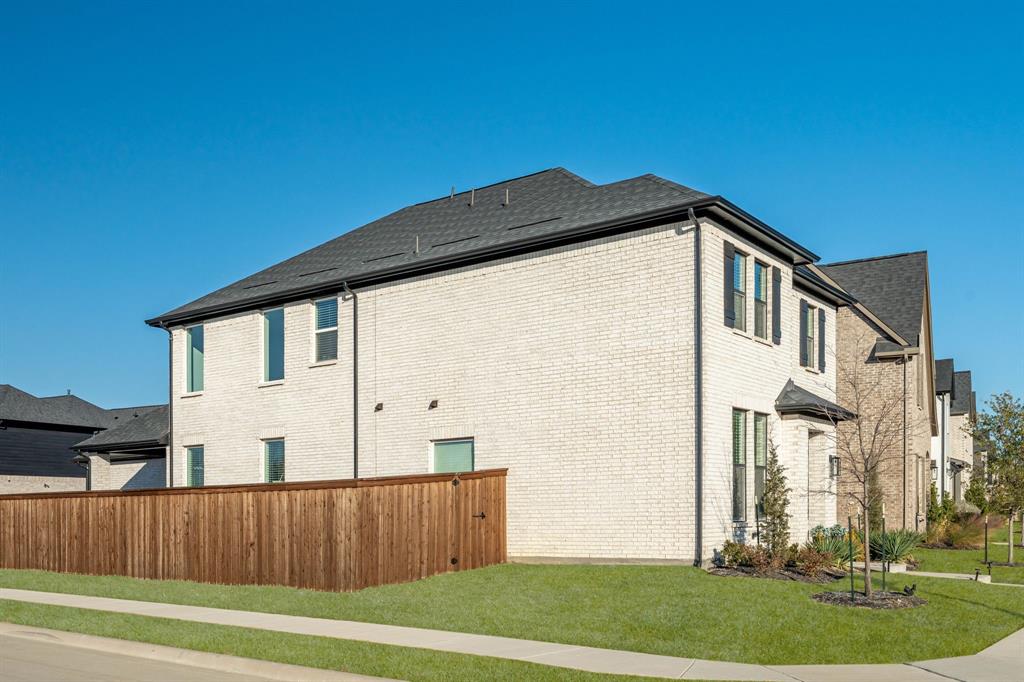 817 Isabel Street Celina, TX 75009 - Photo 28 of 39 a view of a house with a yard