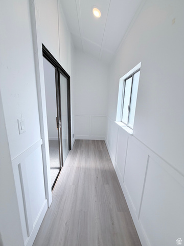 227 South West Lane Provo, UT 84601 - Photo 13 of 25 Hallway featuring wainscoting, wood-finish flooring, recessed lighting, and a sliding glass door