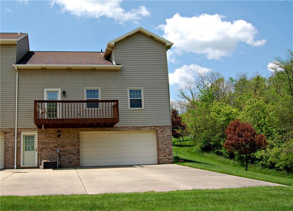 136 East Country Barn Road Houston, PA 15342 - Photo 22 of 25 VIEW OF BACK OF TOWNHOME WITH PLENTY OF DRIVEWAY SPACE