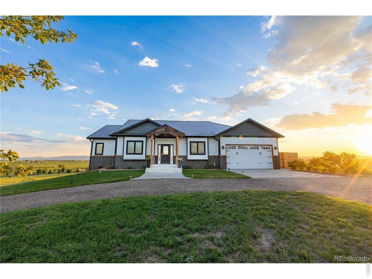 3050 Native Court Wellington, CO 80549 - Photo 2 of 50 Custom home. Endless views. Unreal sunsets.