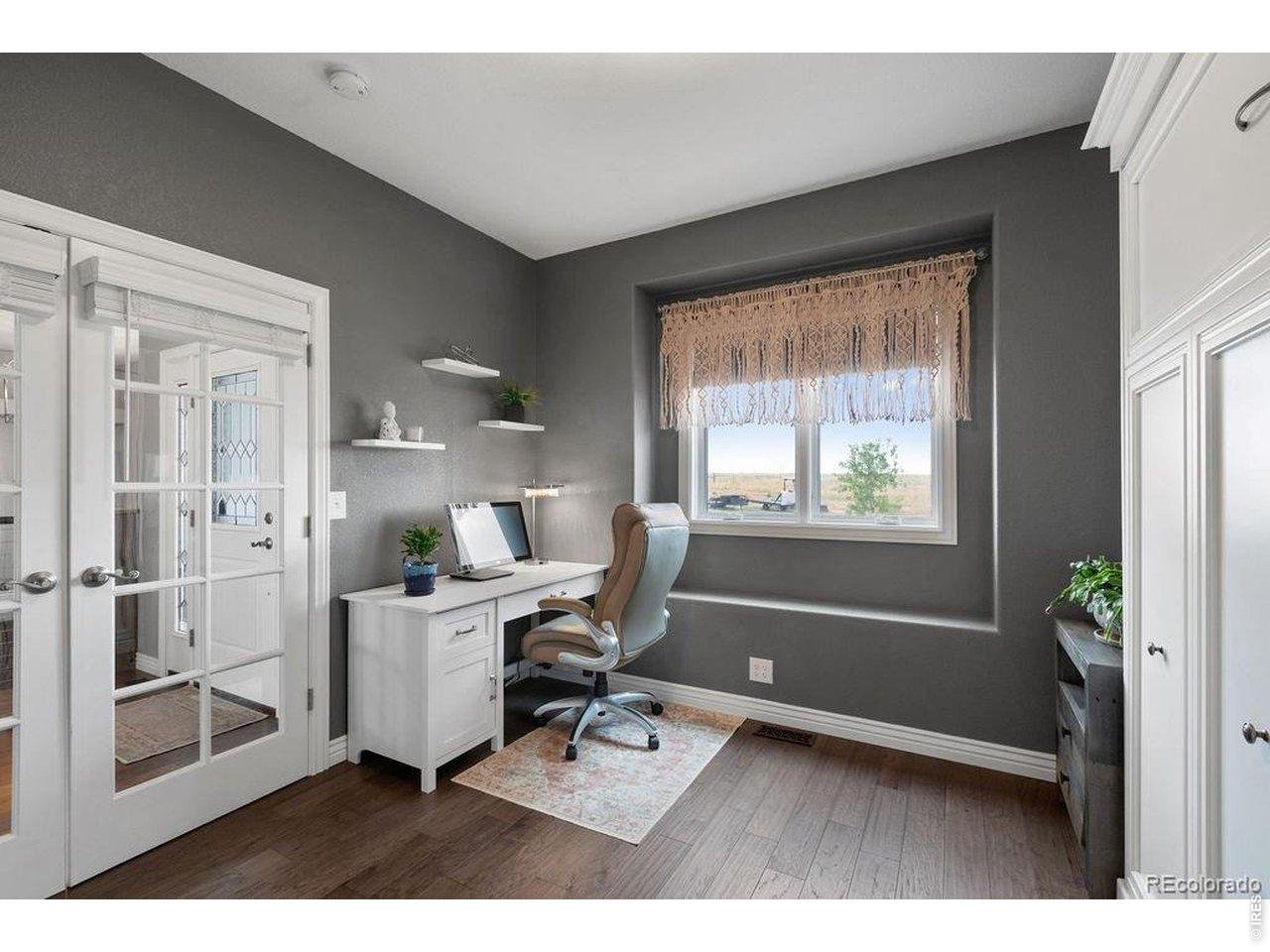 3050 Native Court Wellington, CO 80549 - Photo 10 of 50 Office located just off the entry featuring a built in Murphy bed for added flexibility