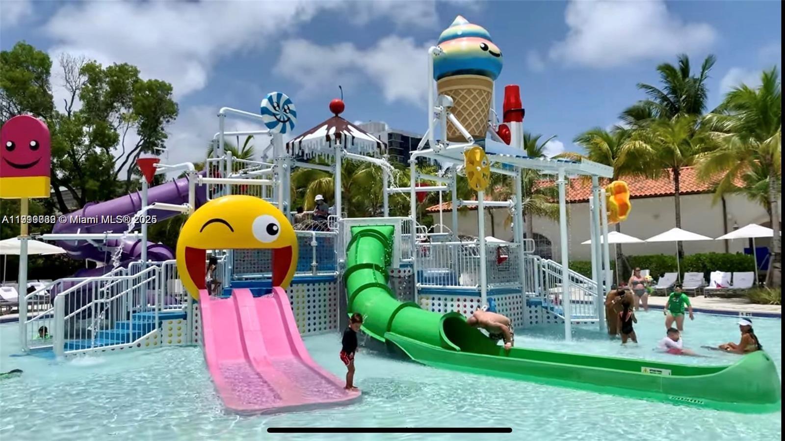 20200 West Country Club Drive, Unit 112 Aventura, FL 33180 - Photo 19 of 20 a multi story building with outdoor seating