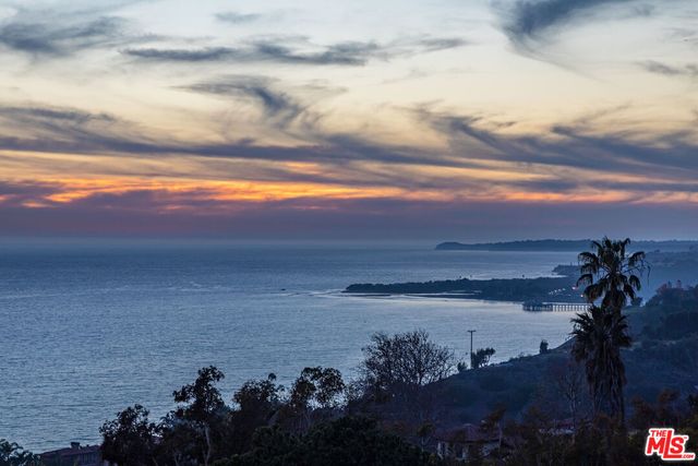 a view of city and a balcony
