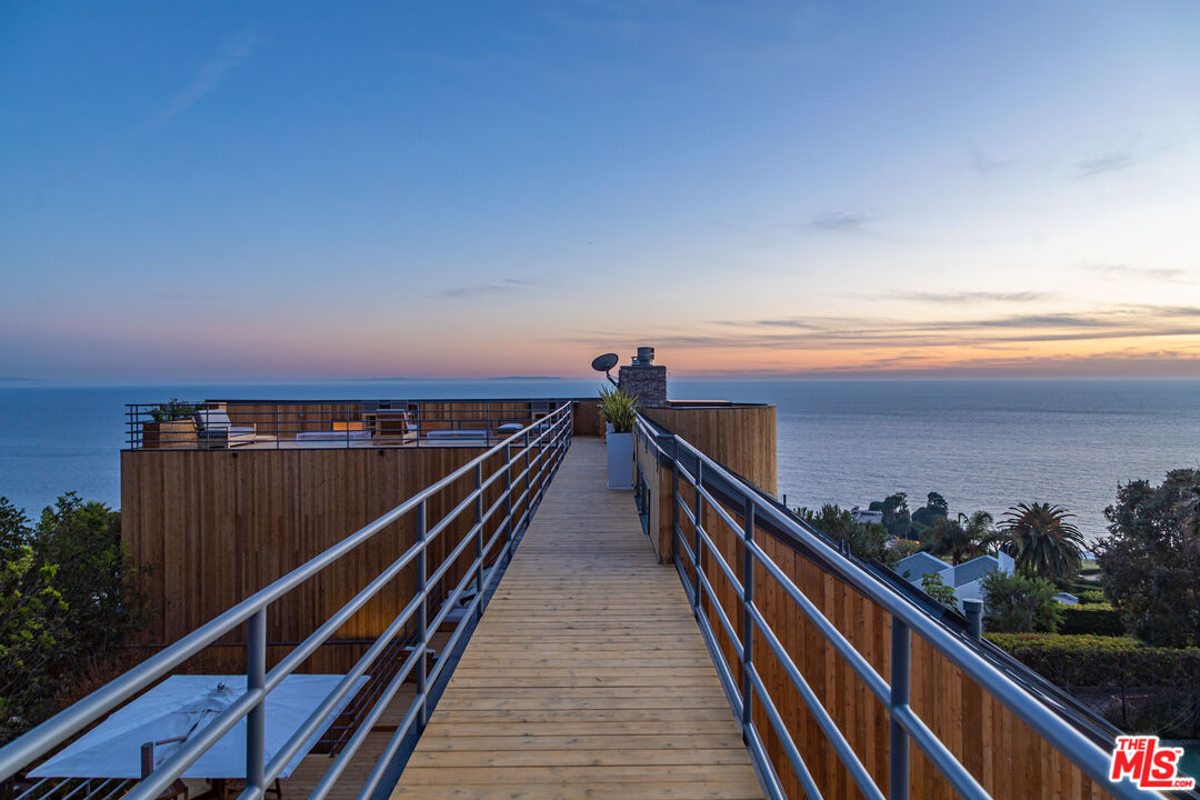 3900 Villa Costera Malibu, CA 90265 - Photo 33 of 43 a view of city and a balcony