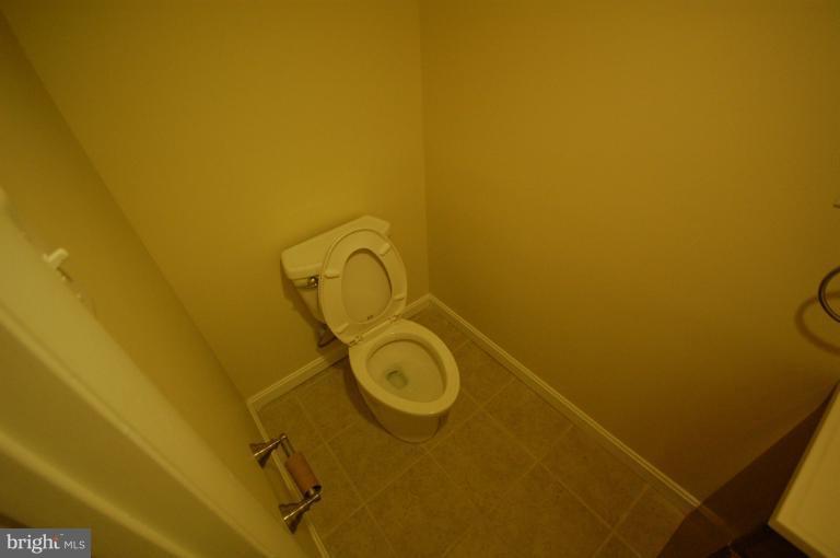 3612 Telmar Road Baltimore, MD 21207 - Photo 14 of 14 a bathroom with a sink and a toilet