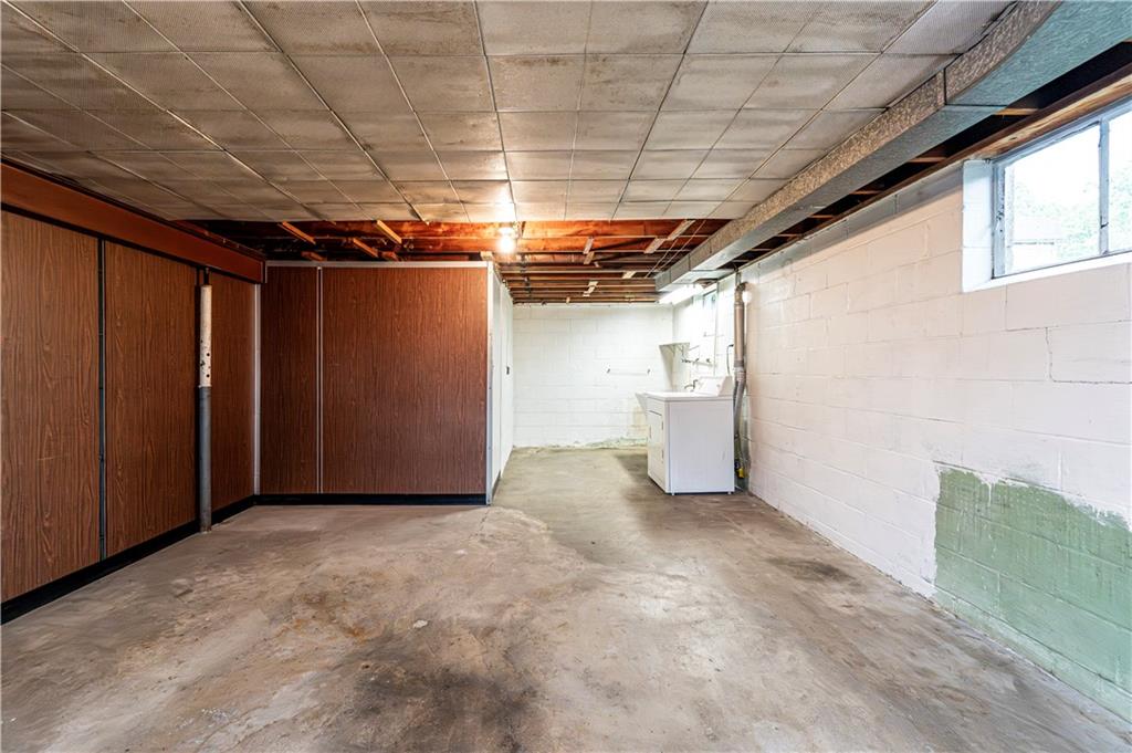 13740 Ridge Road Irwin, PA 15642 - Photo 29 of 43 a view of empty room with wooden walls