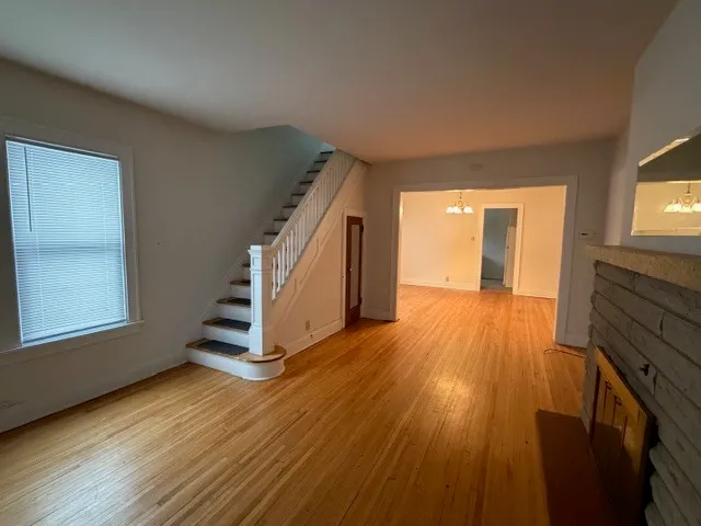 a view of entryway with wooden floor