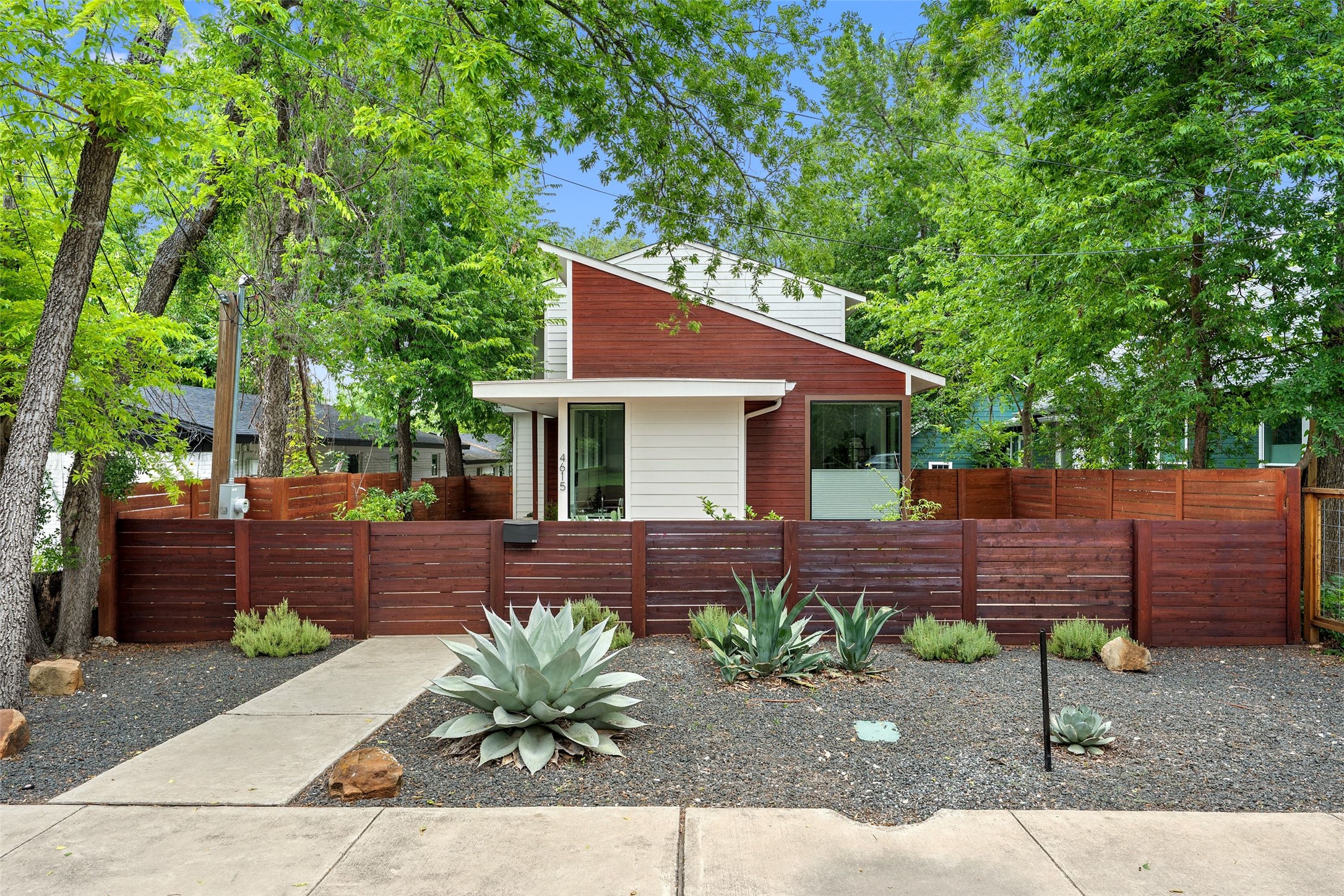 4615 Depew Avenue Austin, TX 78751 - Photo 2 of 40 Front of home with native landscaping and gated front yard