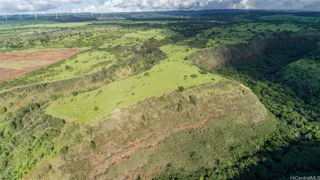a view of a swimming pool with an outdoor seating