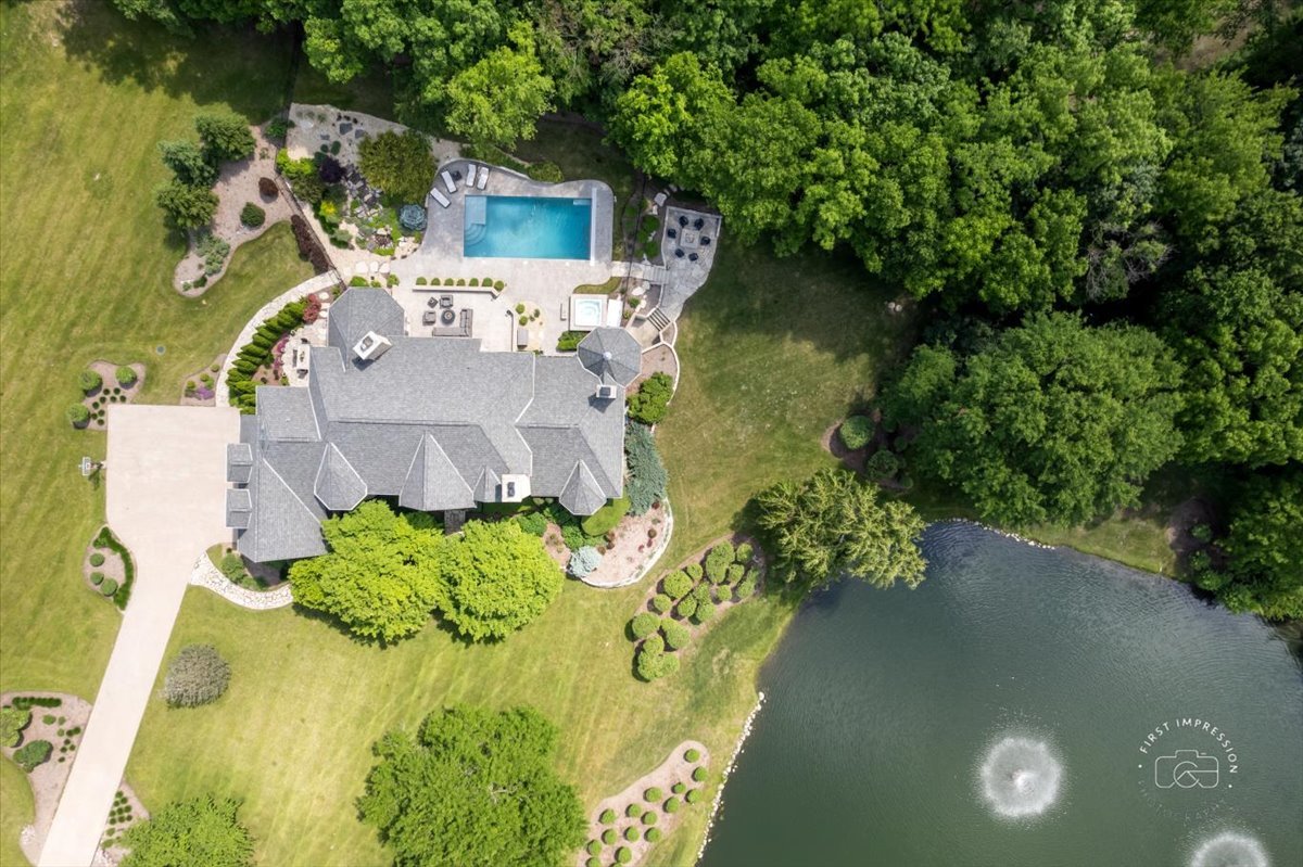 4N749 Old Farm Road St. Charles, IL 60175 - Photo 11 of 46 an aerial view of a house with swimming pool and garden