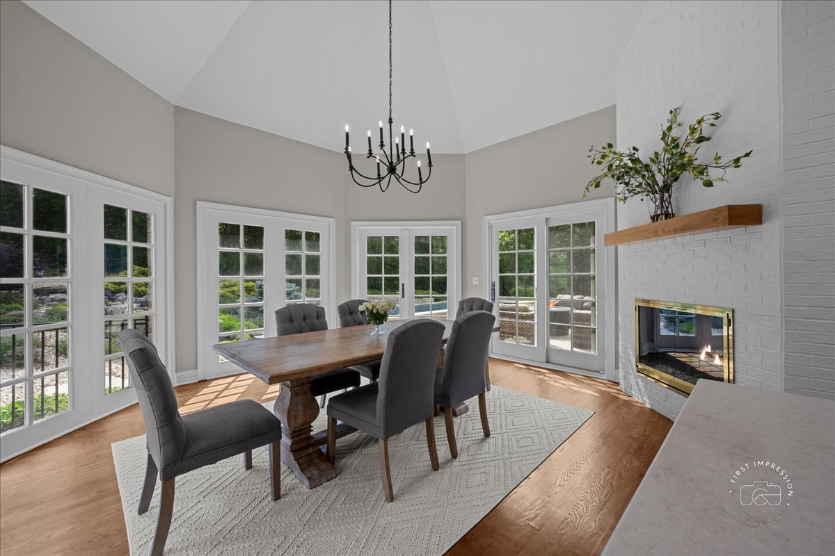 4N749 Old Farm Road St. Charles, IL 60175 - Photo 27 of 46 a view of a dining room with furniture window and wooden floor