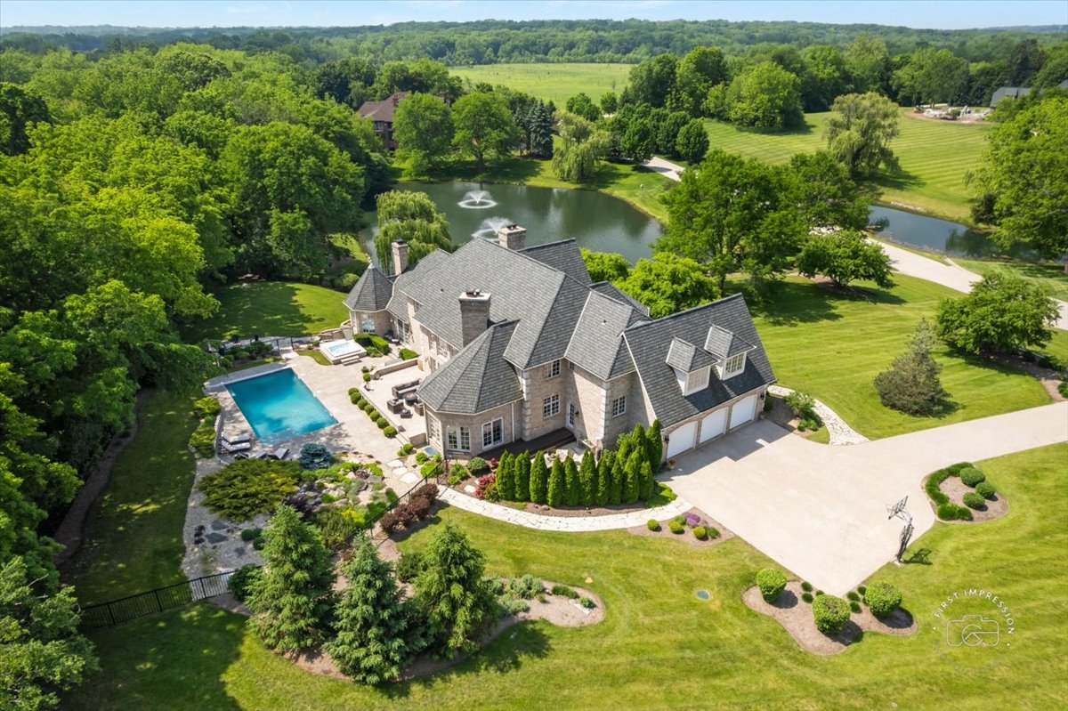 4N749 Old Farm Road St. Charles, IL 60175 - Photo 5 of 46 an aerial view of a house with a yard and lake view