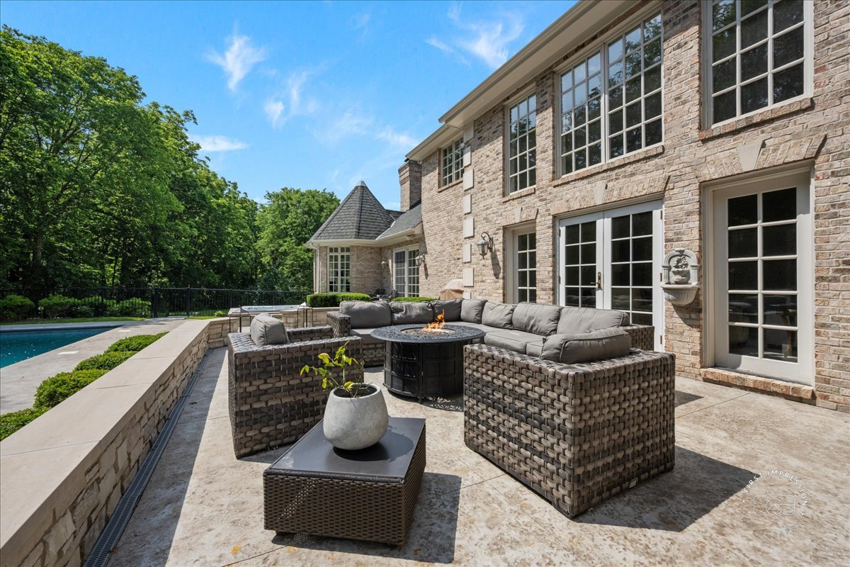 4N749 Old Farm Road St. Charles, IL 60175 - Photo 8 of 46 a view of a patio with couches table and chairs